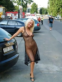 Hottest old cougar is posing almost naked on cam